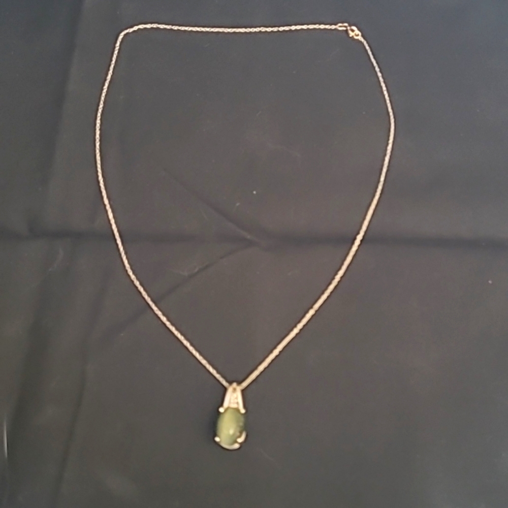 Green tiger's pendant